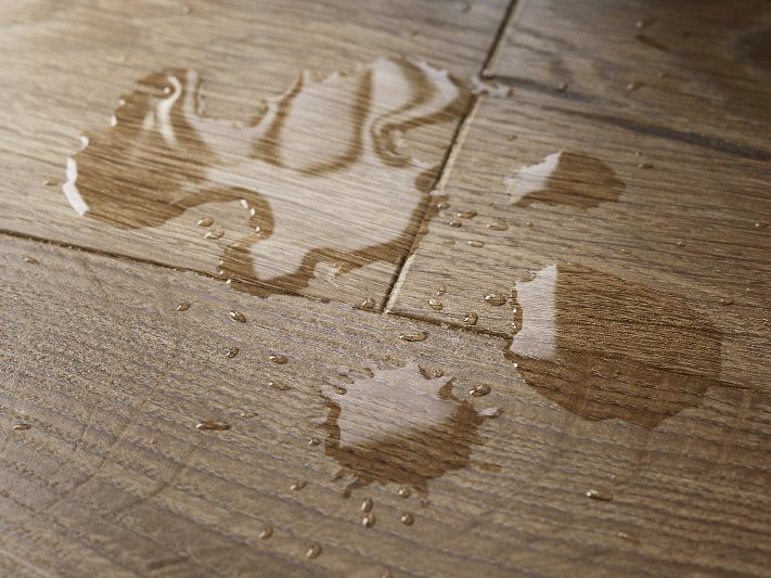 Pergo extreme flooring with a water spill
