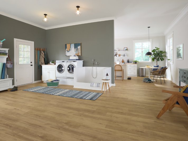 Stylish laundry room with waterproof Pergo flooring